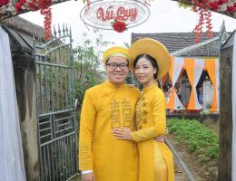 Áo dài cưới màu vàng đồng kết đá