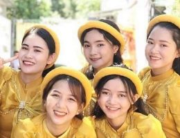 Áo dài bưng quả vàng đồng voal nơ