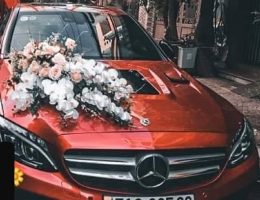 Xe hoa mercedes C300 màu đỏ