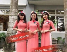 Áo dài bưng quả hồng cam