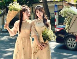 Áo dài bưng quả da thêu hoa